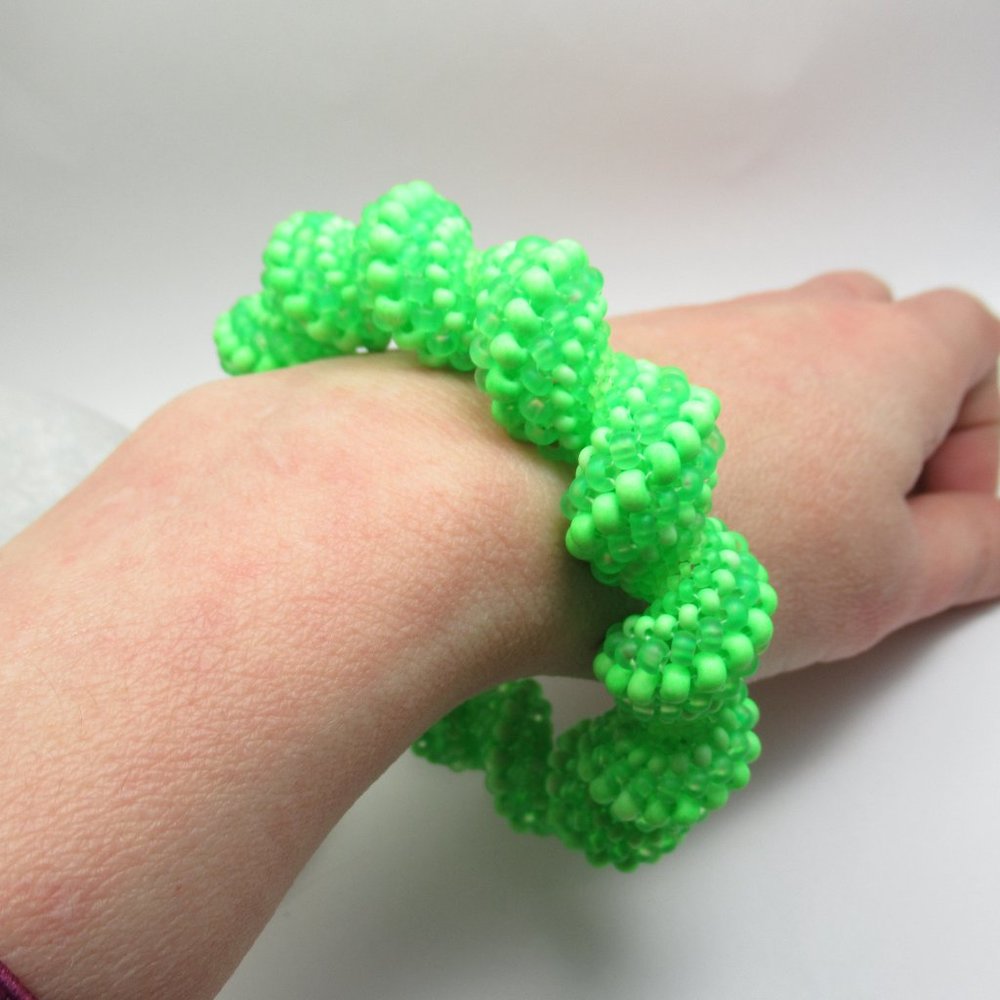 UV reactive Cellini spiral handwoven bangle bracelet